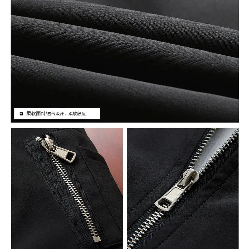 Men's black bomber windbreaker jacket with silver zippers; soft fabric close-up and zipper details