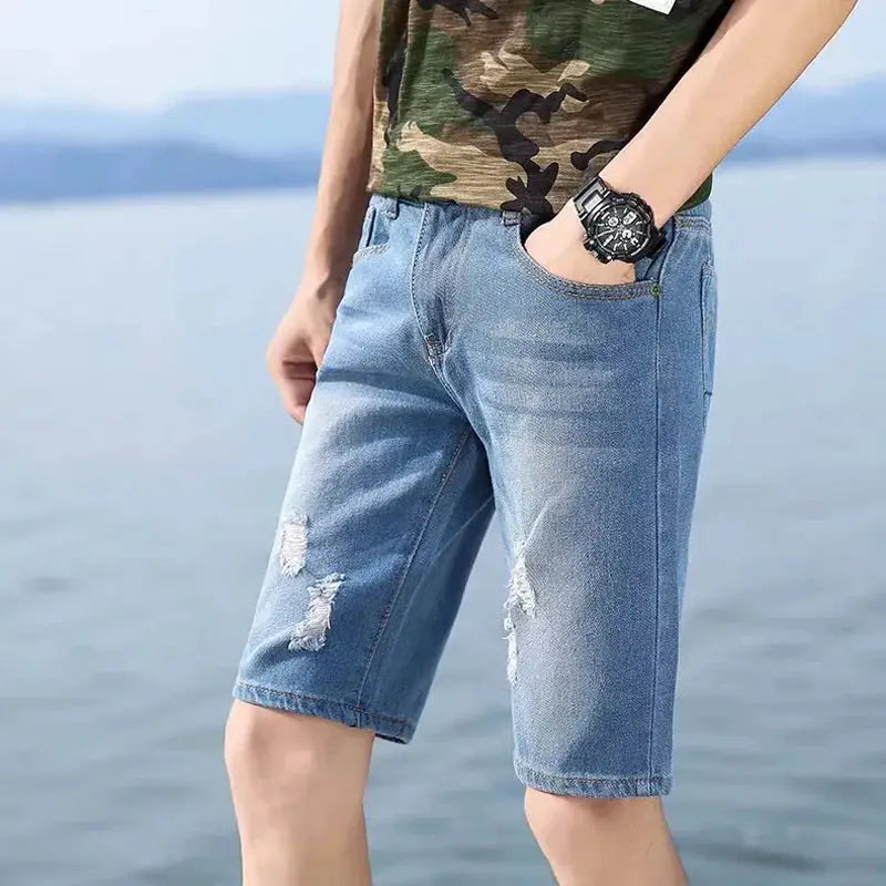 Men's light-blue distressed denim shorts, knee-length casual summer wear