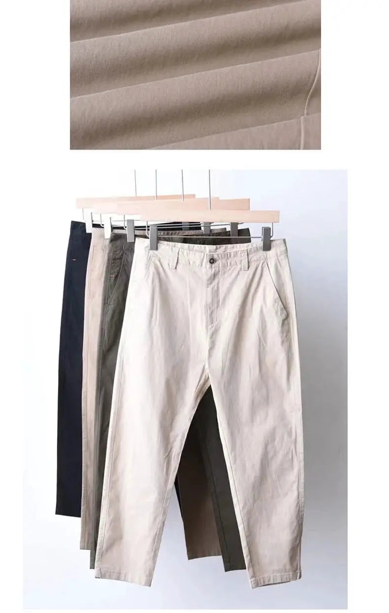 HIQOR men's cotton pants; five pairs on hangers in beige, olive, khaki, gray and navy for a loose casual look.