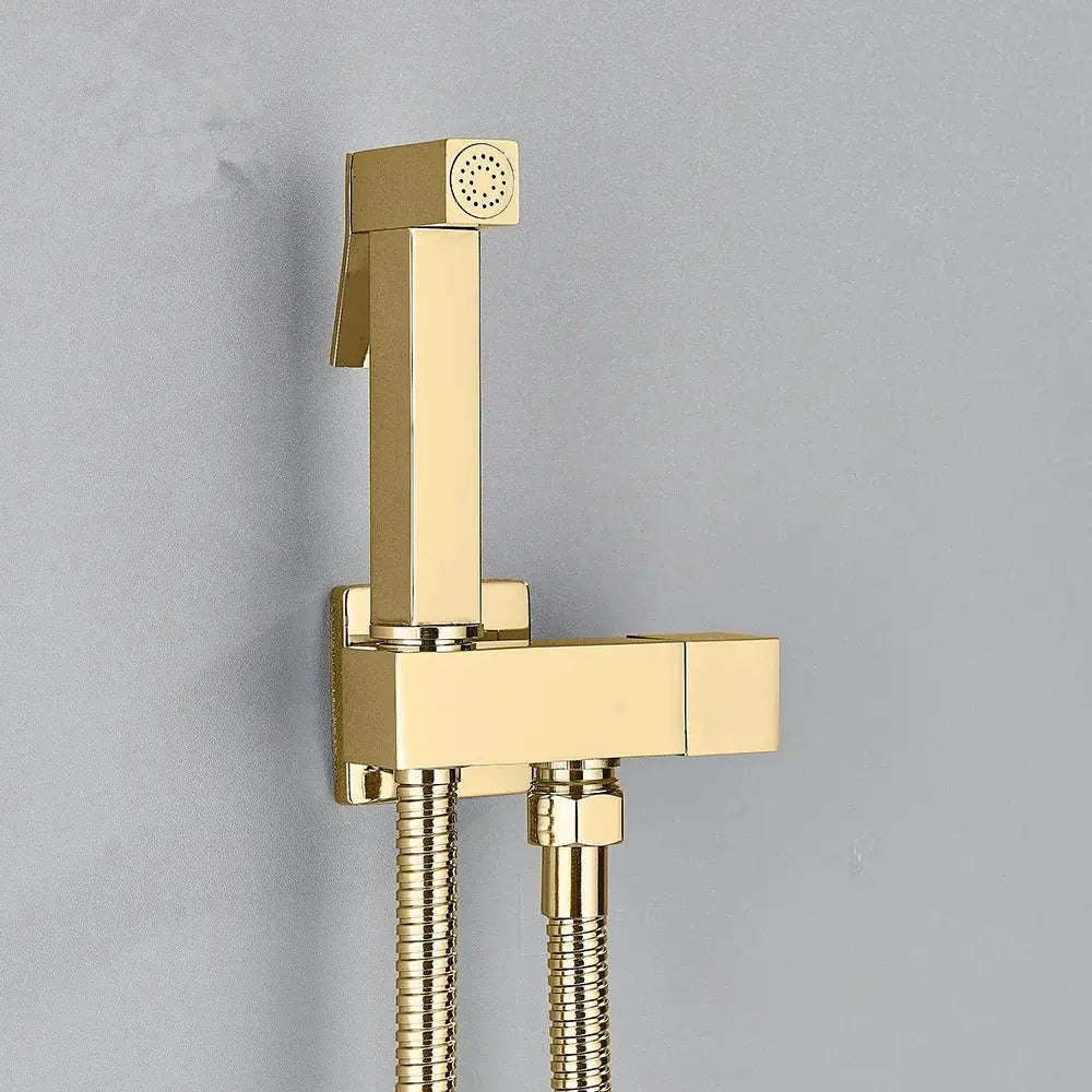 Bathroom bidet faucet by Simples Market in gold brass with handheld shower hose.
