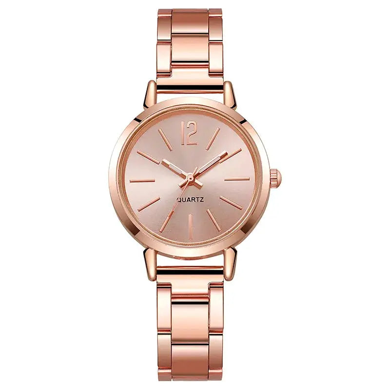 Rose gold-tone women's quartz wristwatch with metal link bracelet, simple dial, fashion accessory for everyday wear