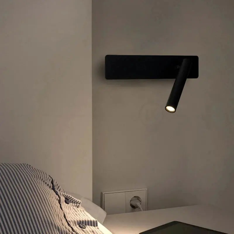 LED wall-mounted reading lamp Simples Market, black minimalist bedside sconce with adjustable cylindrical spotlight