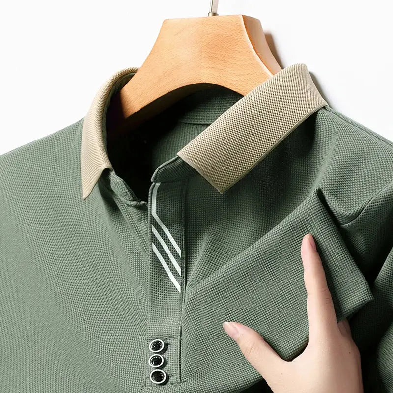 Men's olive-green short-sleeve polo shirt with beige collar, textured knit, three-button placket for summer wear.