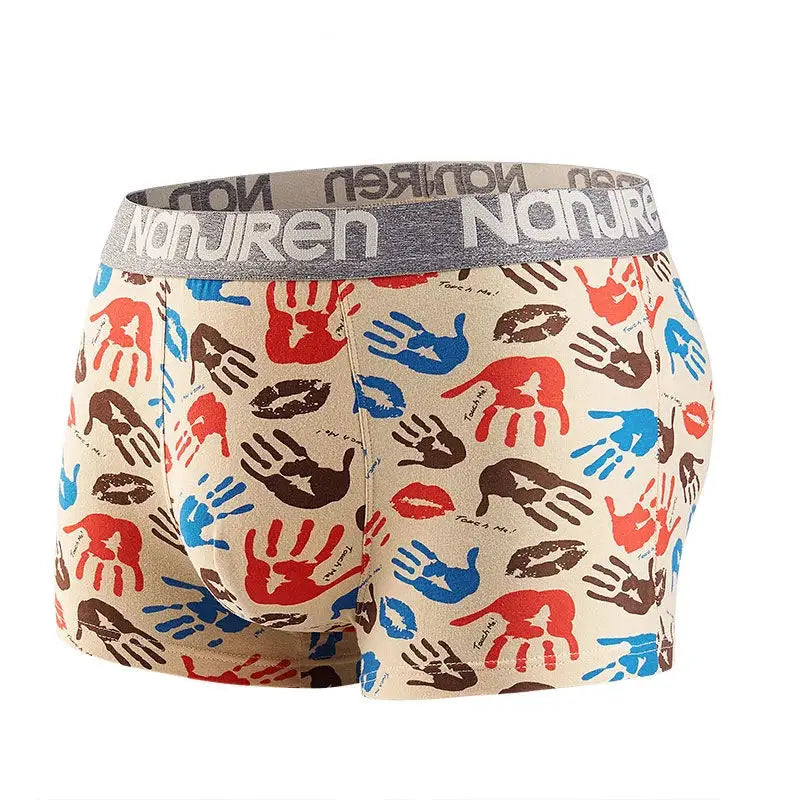Men's boxer shorts in beige with multicolor handprint pattern; gray elastic waistband with logo text.