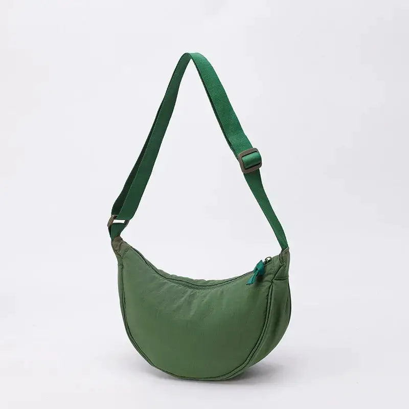 Nylon fabric zipper crescent crossbody bag in green with adjustable strap