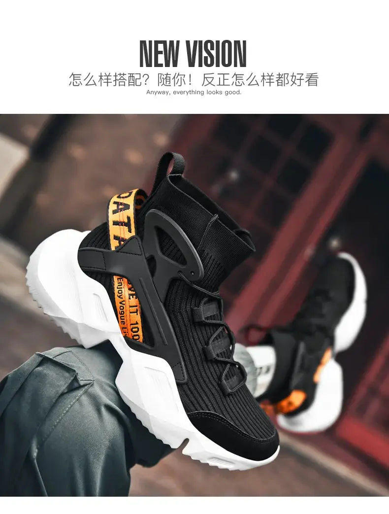 Pair of men's black high-top sneakers with knit upper and orange pull-tab, white chunky sole (Simples Market)
