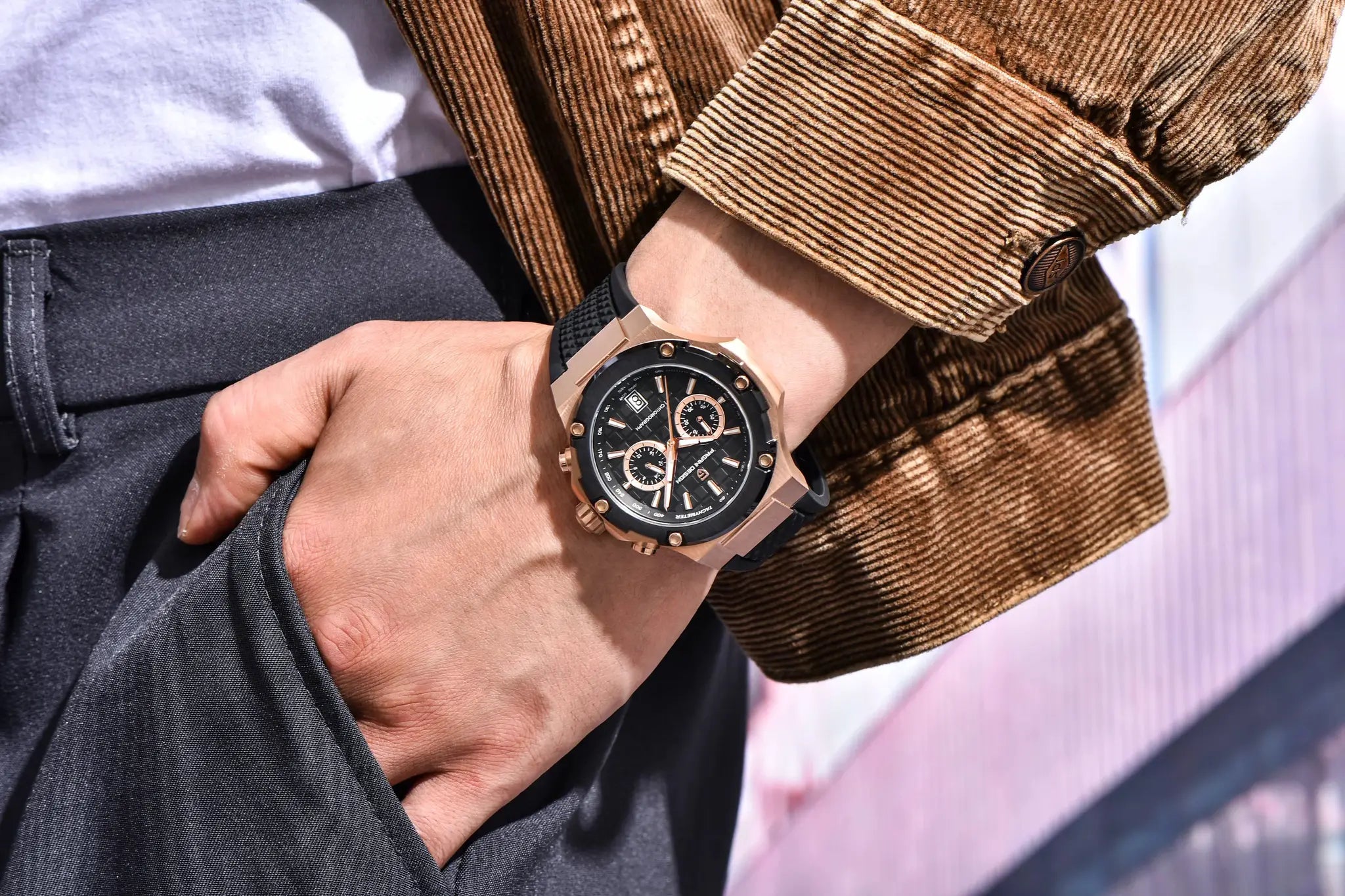 Pagani Design men's chronograph watch with rose-gold case, black dial, fluororubber strap.