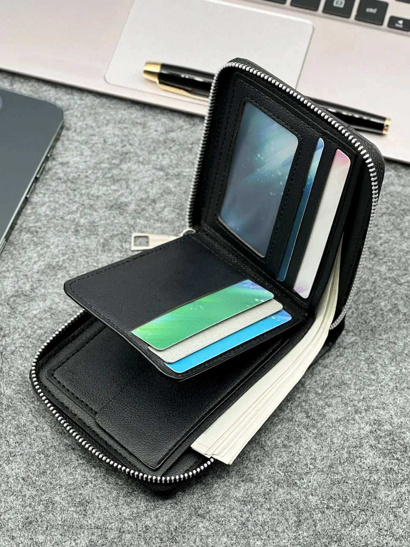 Zippered slim men's PU wallet in black with card slots and cash compartments