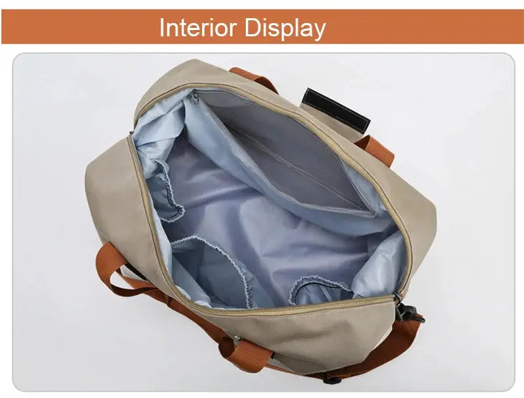 Travel gym bag beige duffle with orange straps, carry-on size, light gray interior with pockets