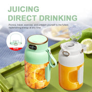 Two 1000ml portable juicer blenders in mint green and white, filled with citrus slices; USB charging