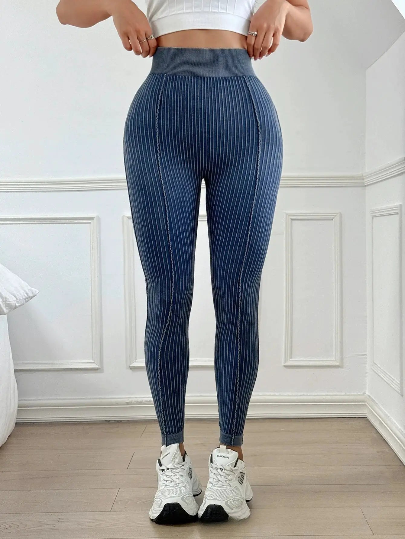 Womens blue ribbed high-waisted leggings with vertical stripe pattern for workout