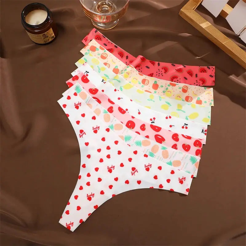 4-pack women's ultra-soft seamless thong underwear with colorful fruit and heart prints in assorted colors