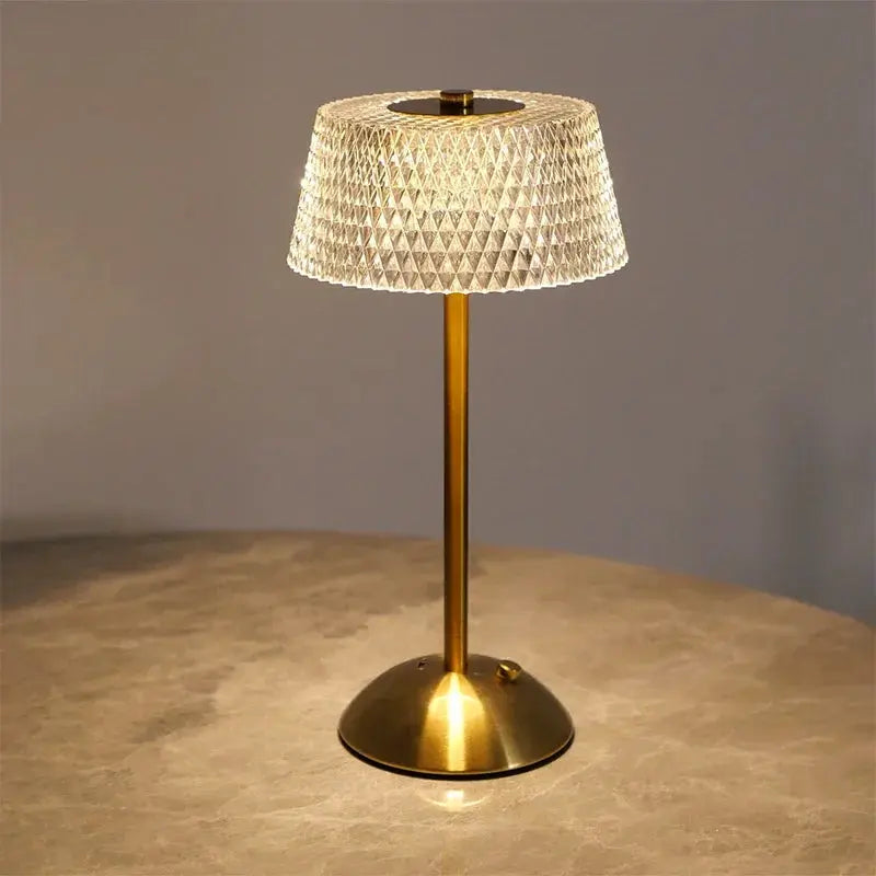 Rechargeable LED night lamp by Simples Market with diamond-pattern glass shade and brass base