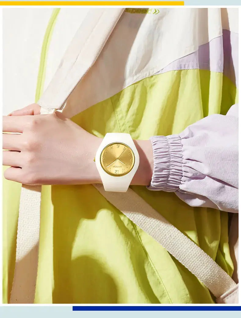 SANDA 6186 white silicone strap quartz wristwatch with gold-tone dial on wrist