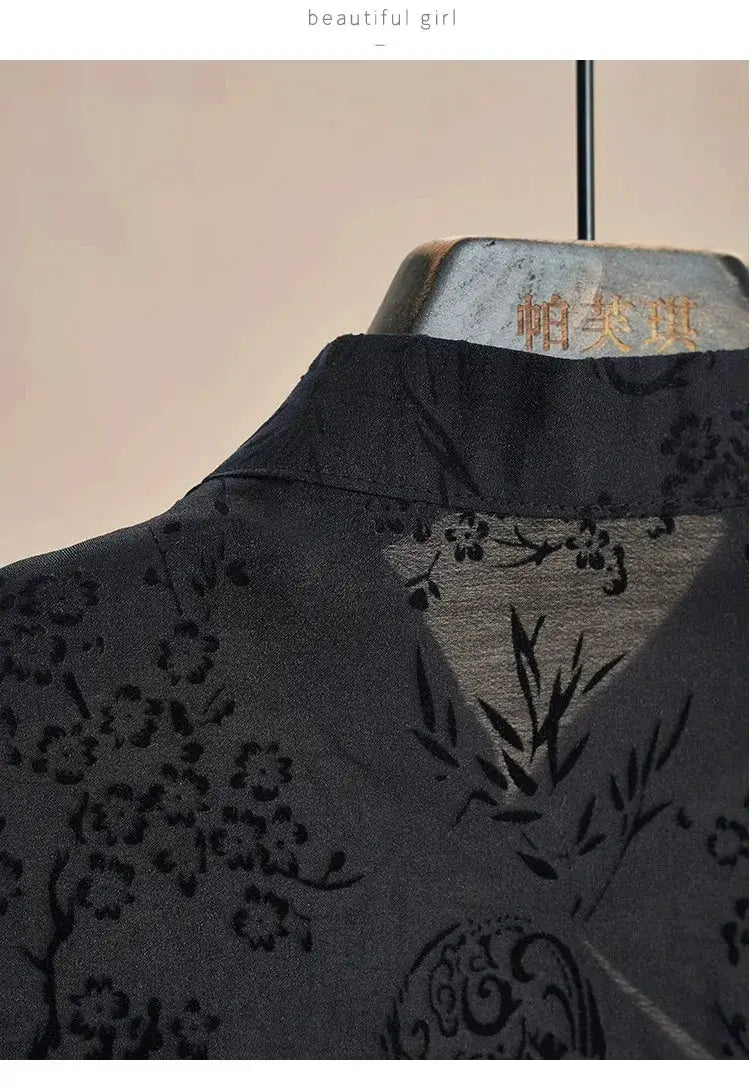 Cheongsam-style black jacquard top with floral pattern and short sleeves