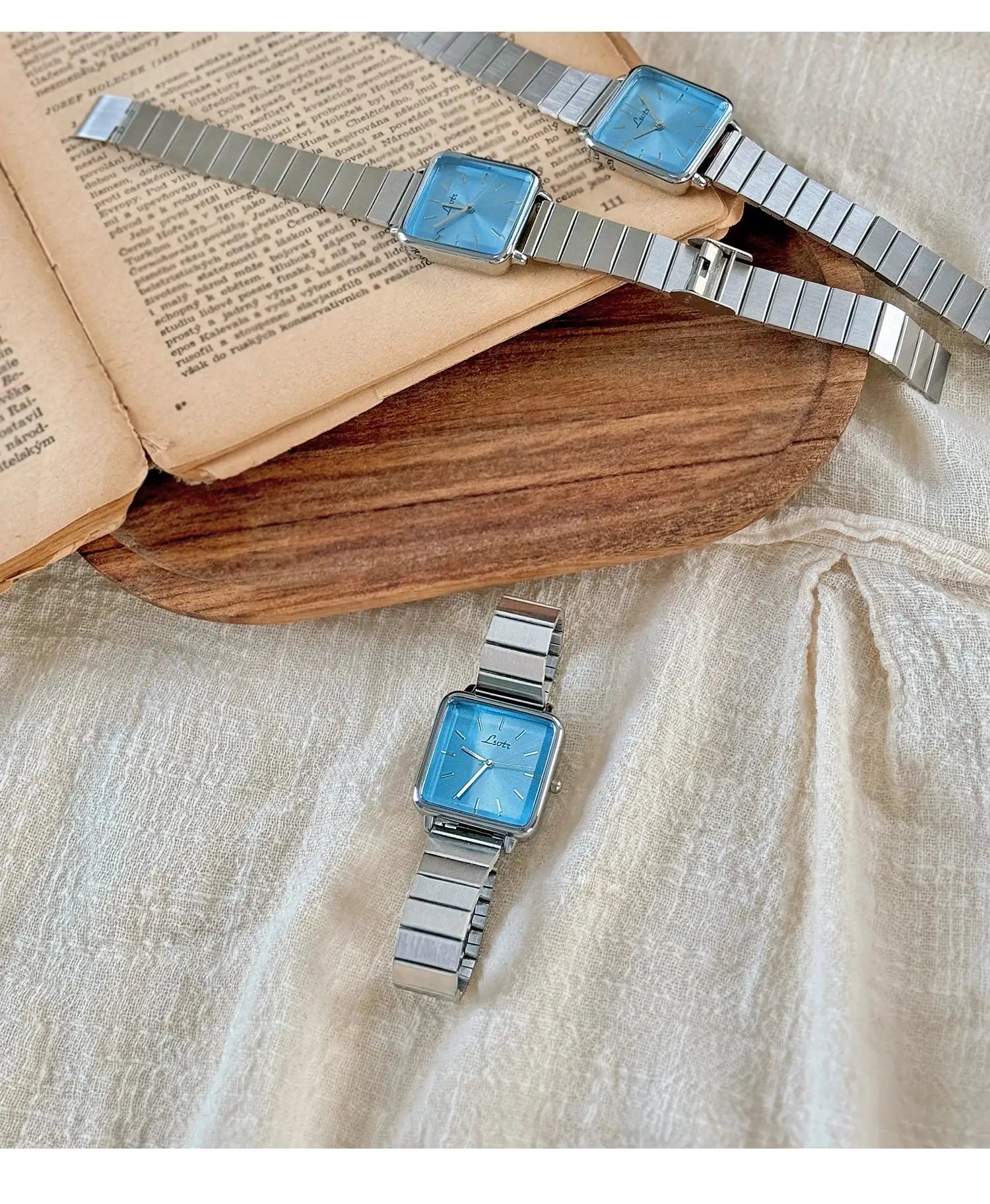 Three Simples Market women's square-dial watches with blue faces and silver stainless steel straps