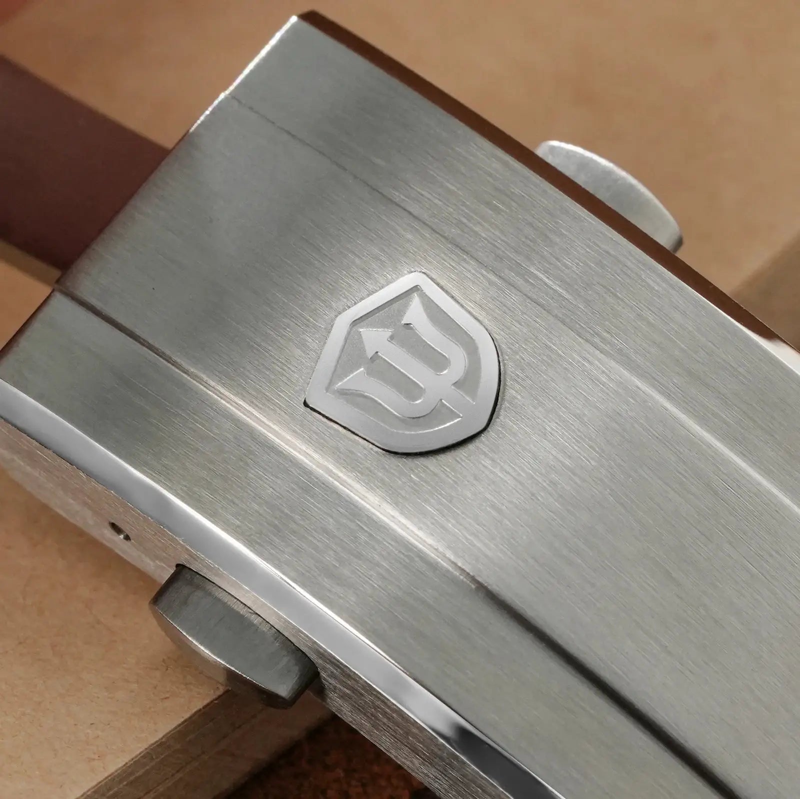 Watchdives stainless steel wristwatch case with brushed finish and shield emblem