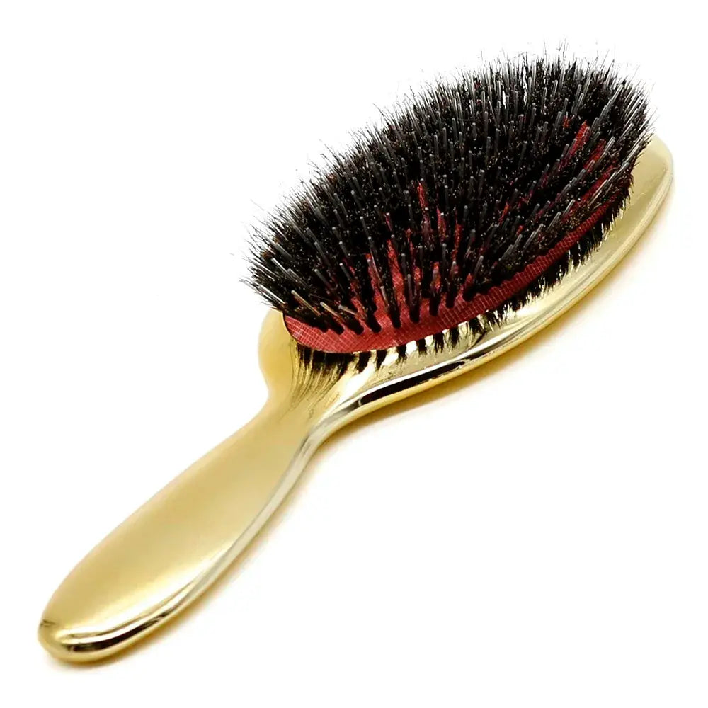 Paddle hair brush by Simples Market, gold-toned handle with black boar bristles and red base, oval anti-static