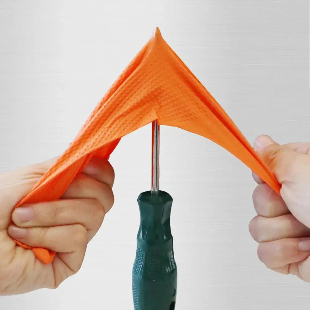 Heavy duty nitrile gloves Simples Market: orange textured grip sheet stretched by hands around a screwdriver