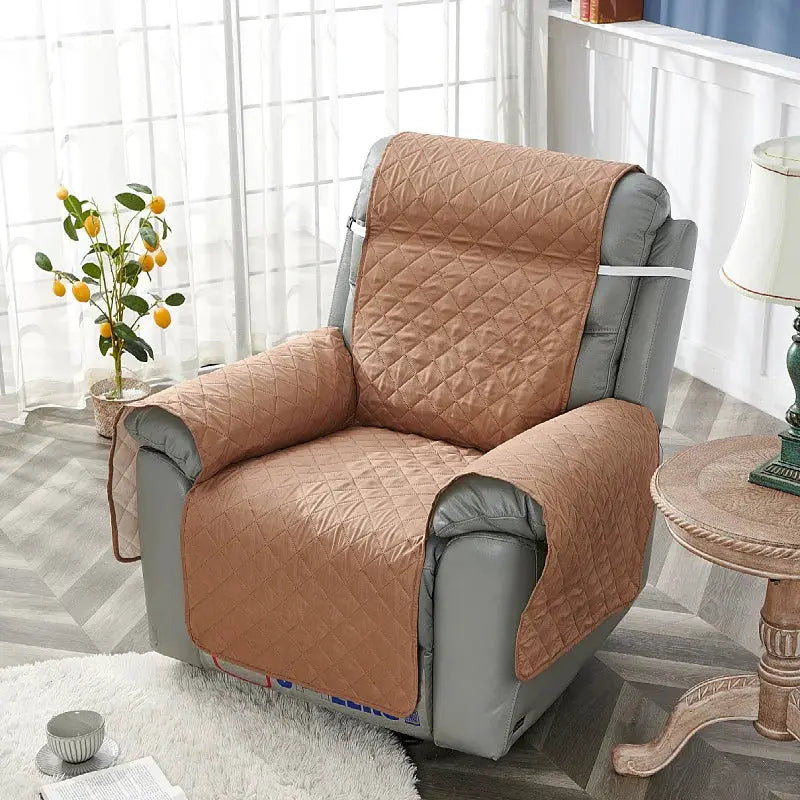 Simples Market anti-slip recliner chair cover; tan quilted slipcover on gray armchair.