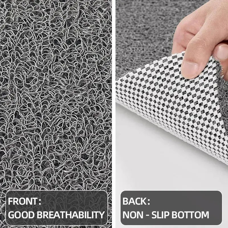 Non-slip hollow bath mat in grey with breathable front surface and non-slip backing.