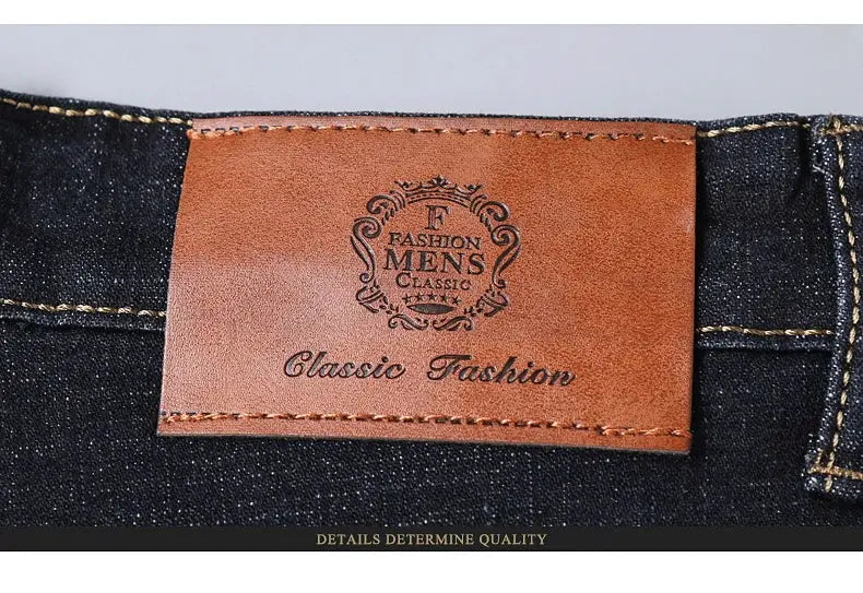 Men's classic denim jeans with brown leather back patch, dark blue, size 32–38