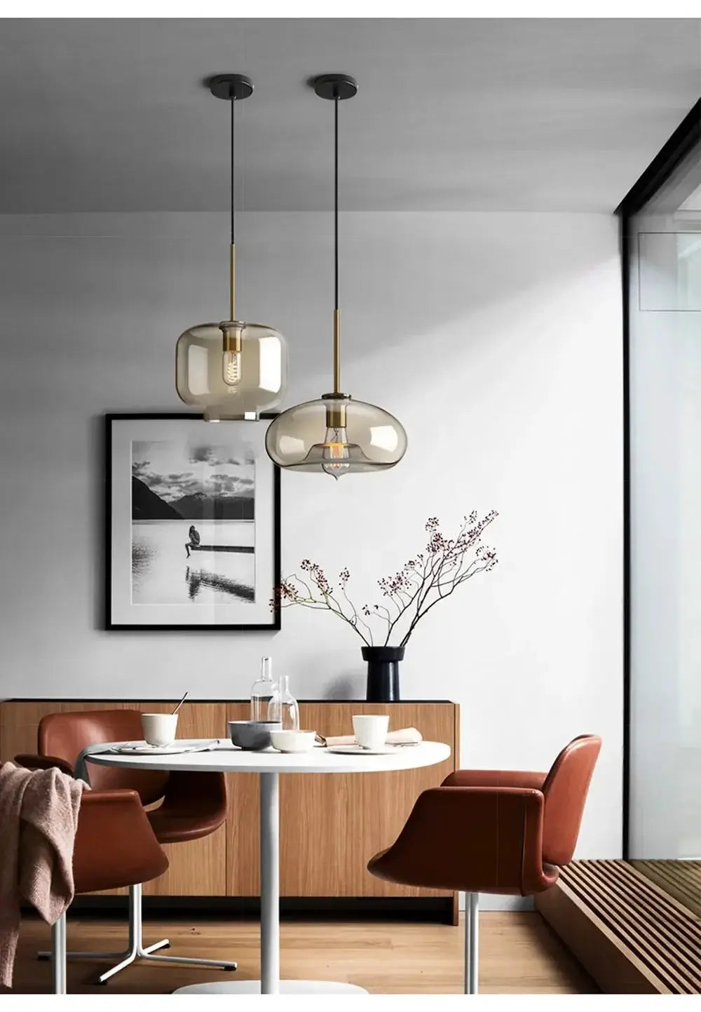 Simples Market Nordic LED glass chandelier, dual smoky amber pendant lights with gold stems over round dining table.