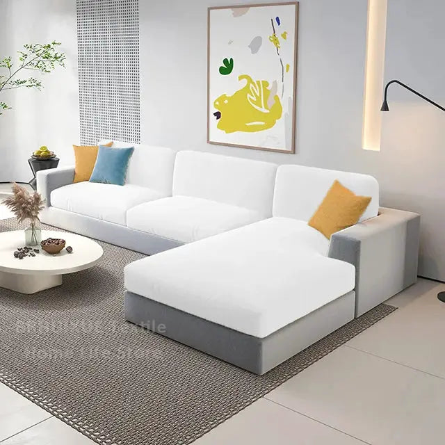 Velvet sofa seat cushion cover by Simples Market for L-shaped sectional; white cushions, gray base.
