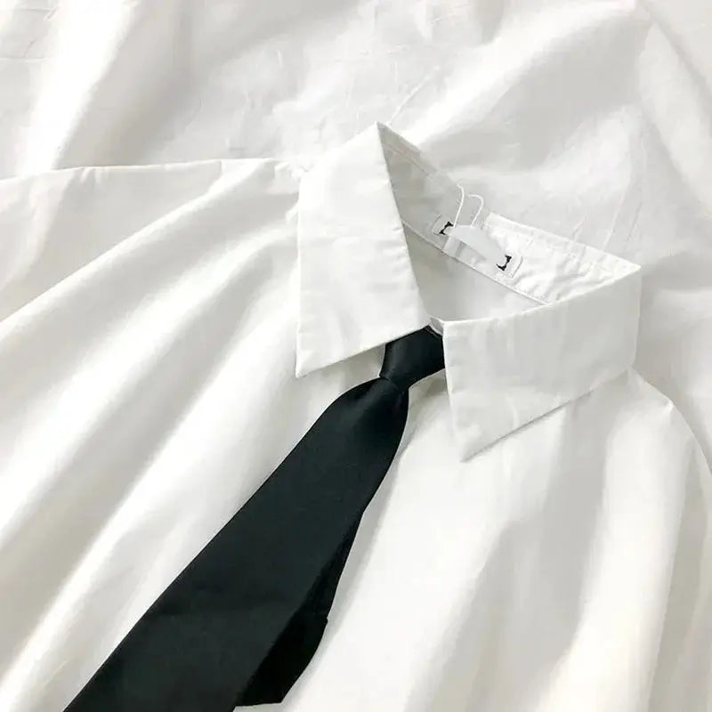 White short-sleeve blouse with lapel collar and black tie, casual college-style top