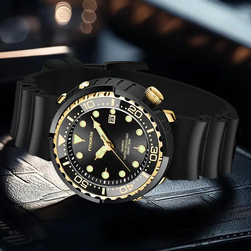 Men's diver watch with black silicone strap, gold-tone bezel, date window, 50ATM waterproof