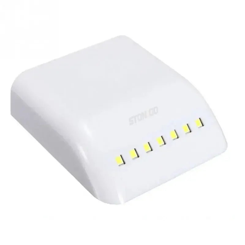 LED cabinet light with wireless motion sensor, white plastic housing by Simples Market