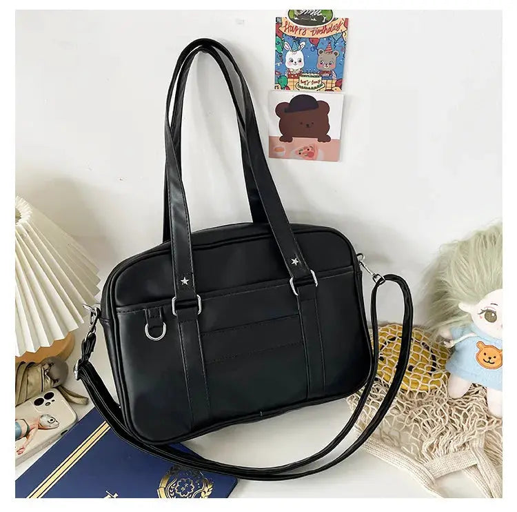 Japanese style JK bag by Simples Market black PU leather shoulder bag with top handles and crossbody strap