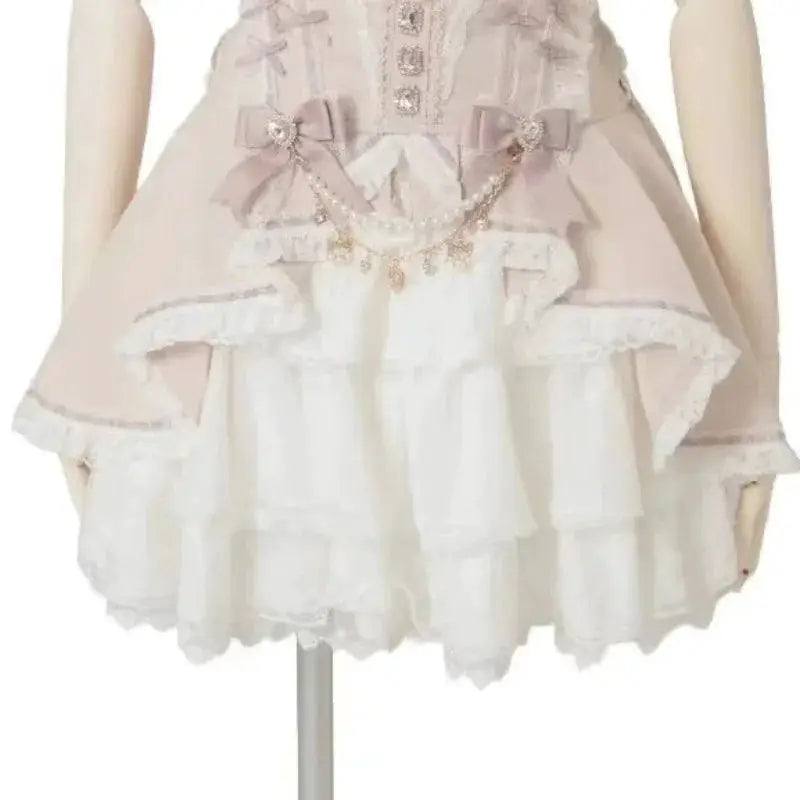 Lolita blouse in pink and white, layered lace with bows and pearl accents