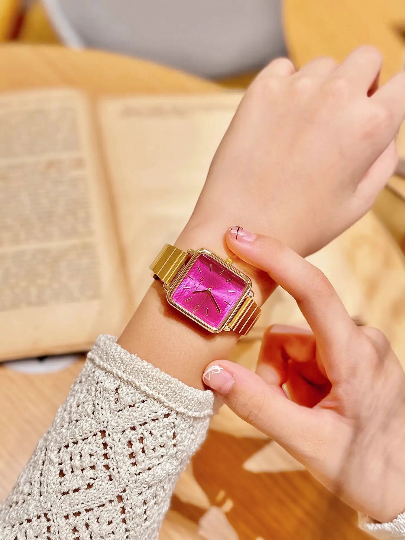 Simples Market women's gold-tone square-dial watch with pink face and stainless steel strap