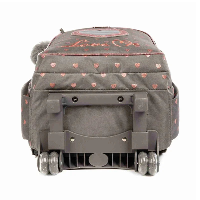 Children's wheeled backpack with pink heart pattern on gray fabric, rolling wheels