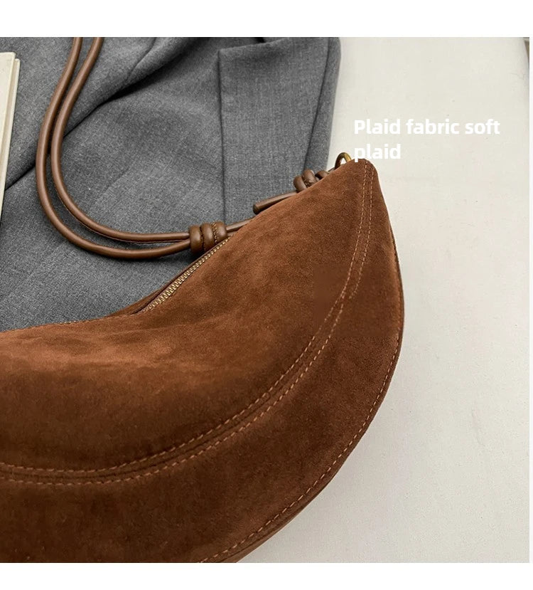 Faux suede shoulder bag in brown with crossbody strap and zipper closure