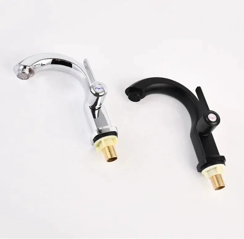 Simples Market basin faucet set: chrome and black, two deck-mounted, single-lever cold-water taps.