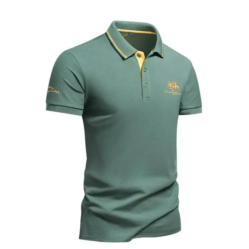 Men's green polo shirt by Simples Market, short sleeves, yellow collar trim, embroidered chest logo