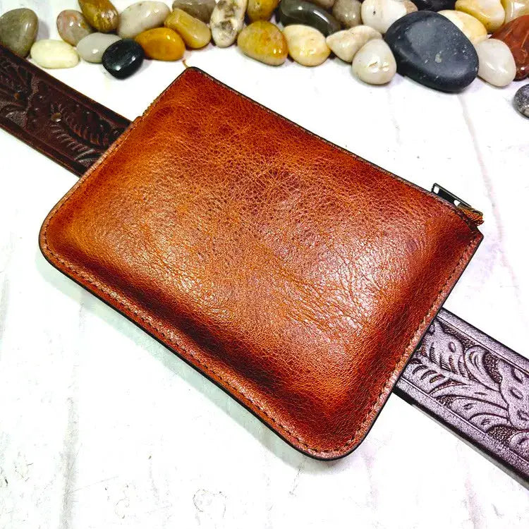 Mini zipper waist bag in brown leather; compact belt-pack for ID, passport, and cards