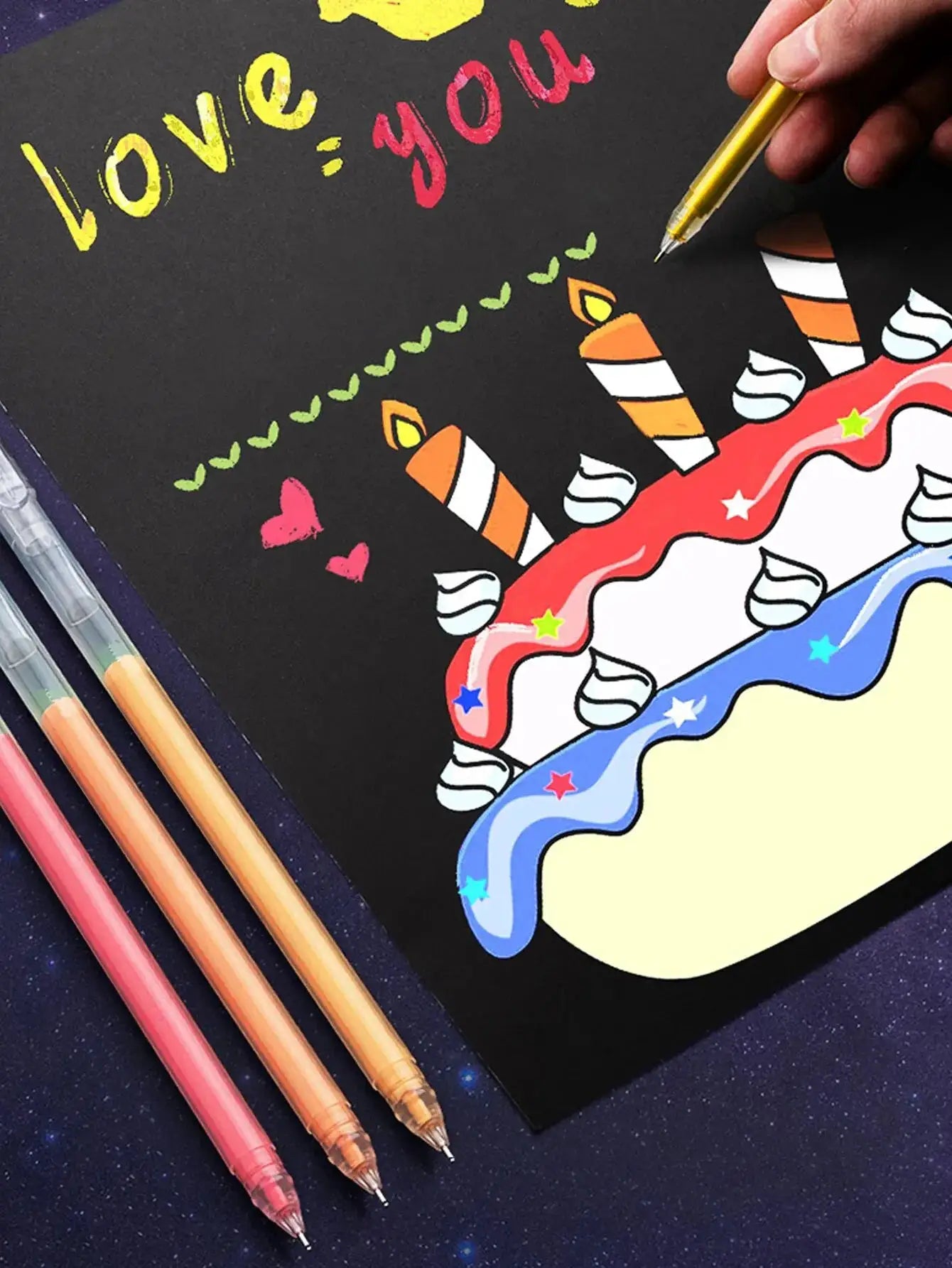 12-color needle-tip gel pen set with 0.5mm tips on black art board for doodling and drawing