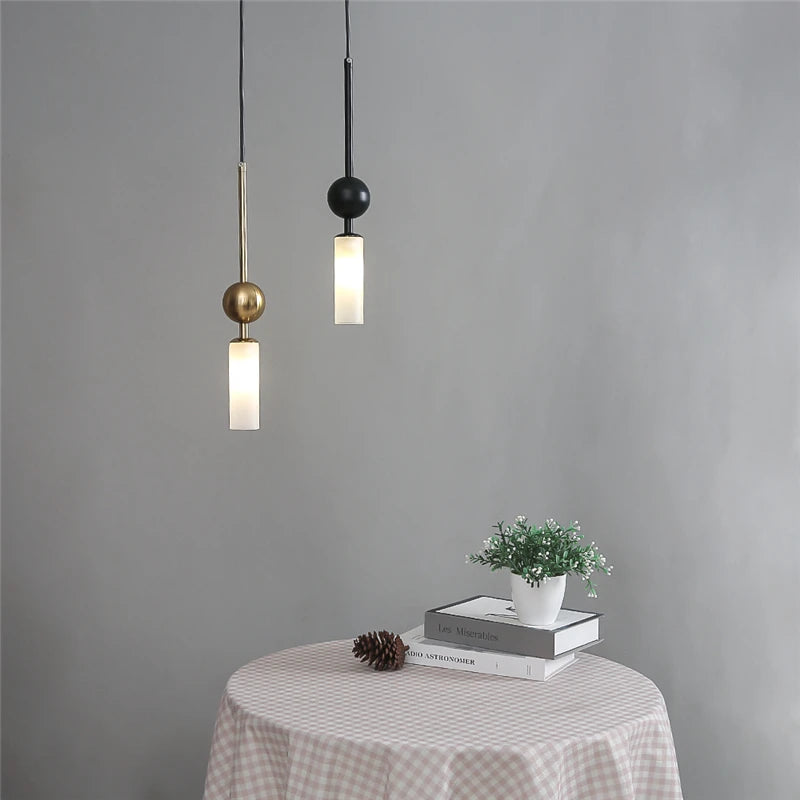 Nordic-style pendant lights, a pair, with frosted glass cylinders in gold and black, LED hanging lamps.