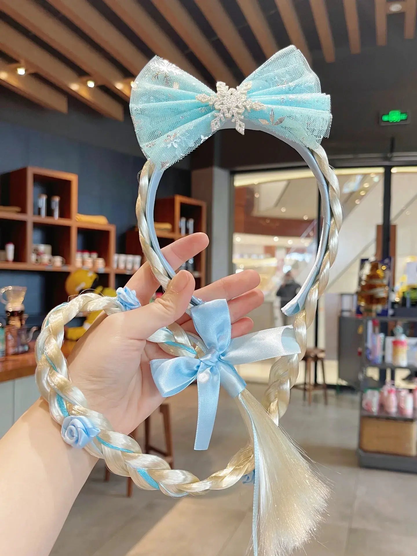 Elsa crown headband with light blue tulle bow, braided blonde strands and crystal snowflake centerpiece