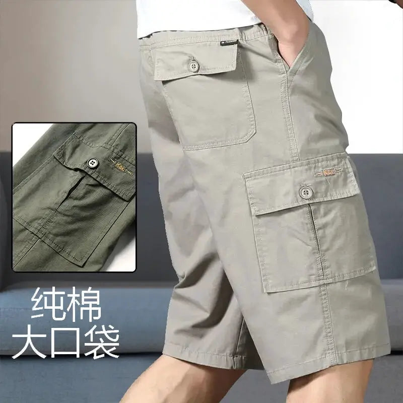 Men's cargo shorts in light khaki cotton with knee-length, large flap pockets and button closures