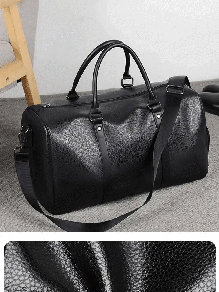 Duffel bag in black pebbled PU leather with dual top handles and detachable shoulder strap, large-capacity travel bag