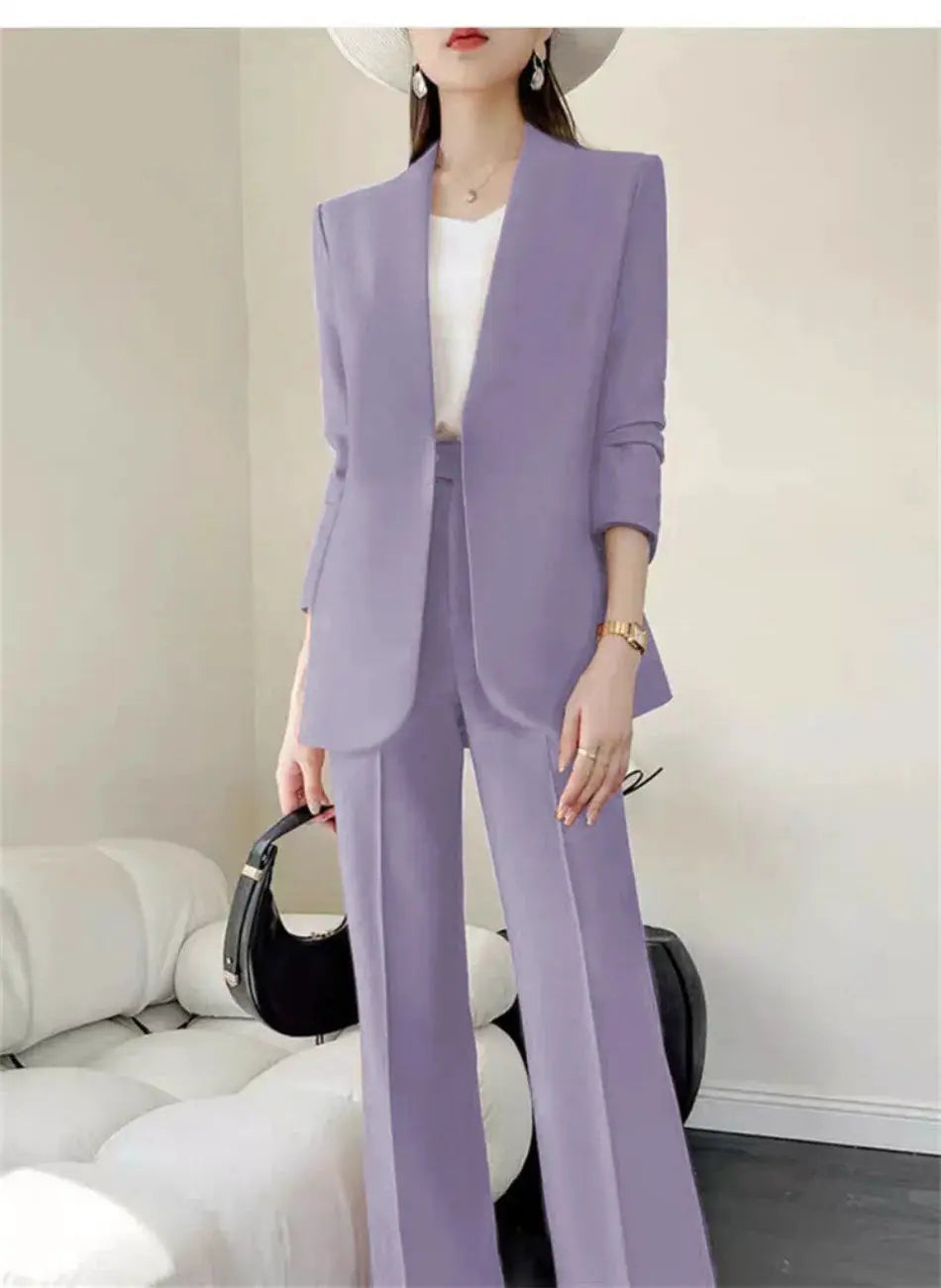 Lavender 2-piece women's suit set with blazer and wide-leg pants, worn by model.