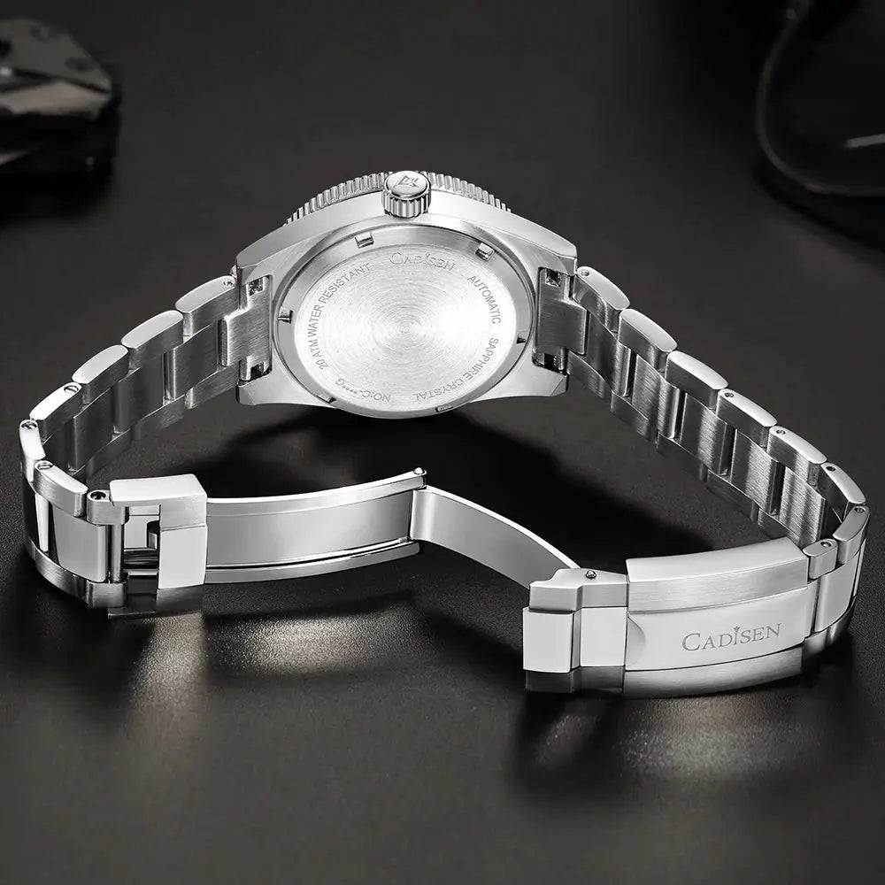 Cadisen stainless steel 38mm diver watch with clasp, automatic movement, sapphire crystal, 100m water resistant.
