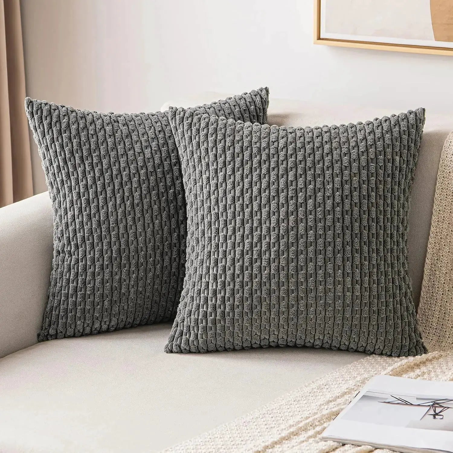 Throw pillow covers in gray corduroy with chunky ribbed texture; farmhouse decor, set of 2 on sofa.