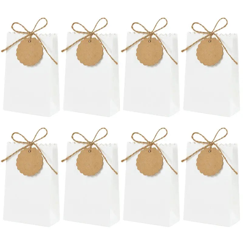 White gift bags with brown round kraft tags and twine, Simples Market set of eight