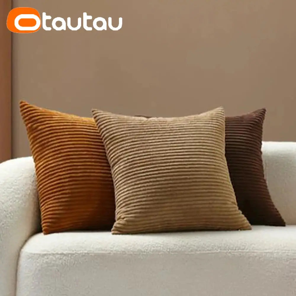 OTAUTAU cotton corduroy cushion covers; three warm-toned cushions in rust, tan and brown on a white sofa