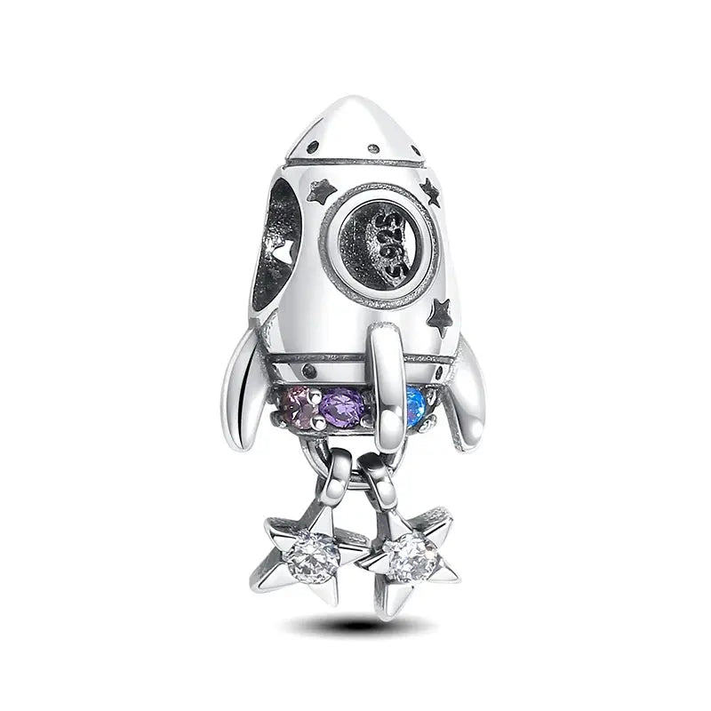Rocket charm bead in sterling silver with zircon stones and dangling star pendants by Simples Market